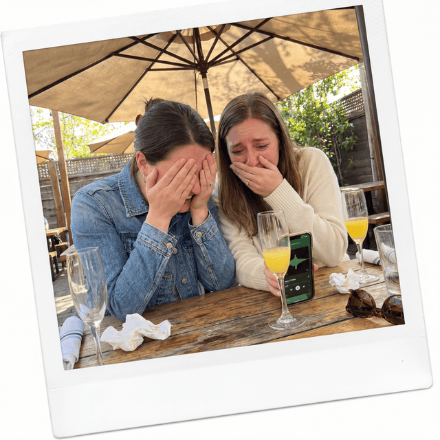 Friends laughing together listening to a custom song